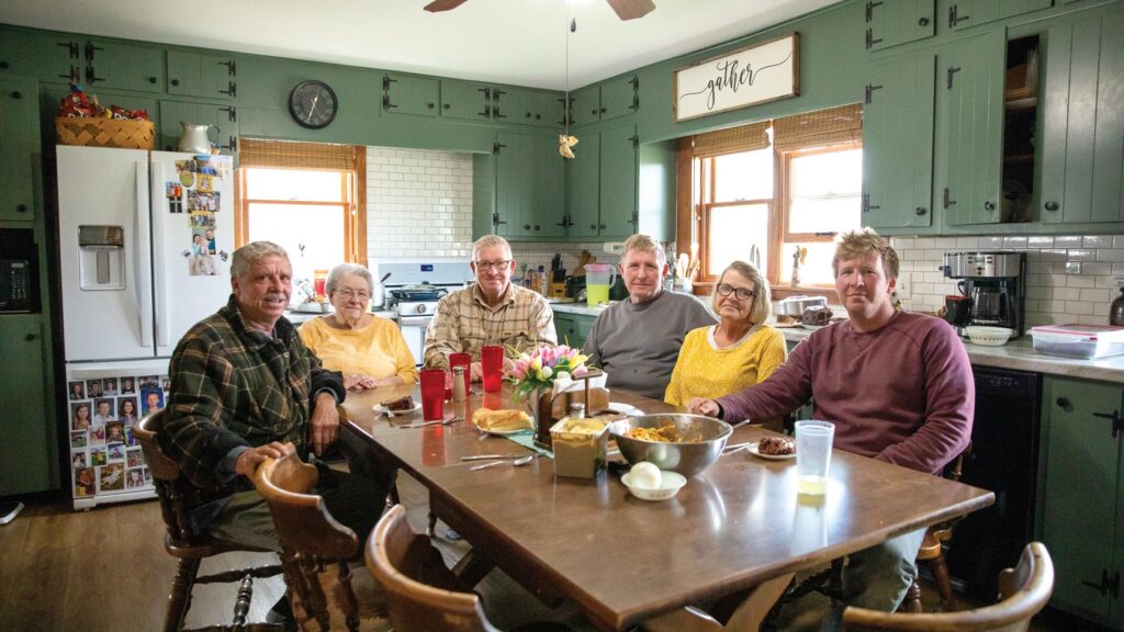 Family gathered around dinner table