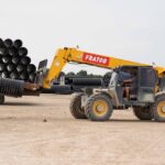 Forklift vehicle picking up Fratco pipe